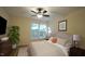Bright bedroom with a ceiling fan, large window, and ample space at 300 Worth St, Raleigh, NC 27601