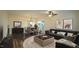 Spacious living room with hardwood floors and modern furniture at 300 Worth St, Raleigh, NC 27601