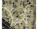 This aerial view showcases a home on a spacious lot with a circular driveway in a suburban neighborhood at 35 Meadow Ln, Franklinton, NC 27525