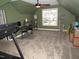 Bonus room with home office setup and cat tree at 35 Meadow Ln, Franklinton, NC 27525