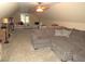 Spacious bonus room with large sectional sofa and lots of natural light at 35 Meadow Ln, Franklinton, NC 27525