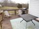 Wooden deck with patio table, chairs, and grill at 35 Meadow Ln, Franklinton, NC 27525