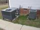 Two outdoor HVAC units on concrete pads at 35 Meadow Ln, Franklinton, NC 27525
