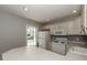 Small kitchen with white cabinets and mosaic backsplash at 35 Meadow Ln, Franklinton, NC 27525