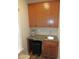 Functional laundry room with cabinets, sink, and countertop space at 35 Meadow Ln, Franklinton, NC 27525