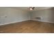 Simple living room with hardwood floors and ceiling fan at 35 Meadow Ln, Franklinton, NC 27525