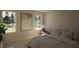 Cozy bedroom featuring natural light, a neutral palette, and serene views from large windows at 403 Carolyn Ct, Cary, NC 27511