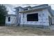 New construction two-story home covered in Sagebuilt wrap, highlighting the modern architectural details and framing at 403 Carolyn Ct, Cary, NC 27511
