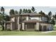 This modern home boasts stone accents, large windows, professional landscaping and a three-car garage at 403 Carolyn Ct, Cary, NC 27511