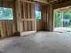 New construction with wooden framing showcases open windows and spacious layout of first floor at 403 Carolyn Ct, Cary, NC 27511