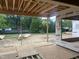 Home's interior under construction reveals the exposed framework looking out onto the exterior at 403 Carolyn Ct, Cary, NC 27511