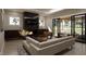 Modern living room showcasing a sleek fireplace and access to a tranquil outdoor space at 403 Carolyn Ct, Cary, NC 27511