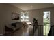 Cozy loft with stylish furniture, modern art, and a view of the green lawn at 403 Carolyn Ct, Cary, NC 27511