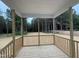 Covered back porch overlooking a private, wooded backyard at 404 Brodie Rose Landing Way, Smithfield, NC 27577