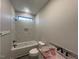 The bathroom features modern fixtures, a shower, and sleek design at 541 Delma Grimes Rd, Coats, NC 27521
