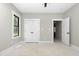 Bright bedroom with a double door closet at 541 Delma Grimes Rd, Coats, NC 27521