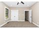 Neutral bedroom featuring carpet floors, recessed lighting, a ceiling fan, and window at 541 Delma Grimes Rd, Coats, NC 27521
