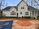 Two story house with a large backyard and inground pool at 5621 Voorhees Ln, Holly Springs, NC 27540