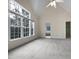 Main bedroom with vaulted ceiling and access to en-suite bathroom at 5621 Voorhees Ln, Holly Springs, NC 27540