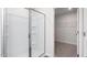 Modern bathroom with a glass shower and closet at 6012 Sodium St, Raleigh, NC 27610