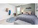 Cozy bedroom with a bed and stylish decor at 6012 Sodium St, Raleigh, NC 27610