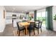 Modern kitchen with white cabinets, granite counters, and kitchen island at 6012 Sodium St, Raleigh, NC 27610