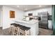 Modern kitchen with stainless steel appliances and kitchen island at 6012 Sodium St, Raleigh, NC 27610