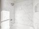 Bathroom featuring a shower and tub combo with marble tile at 624 S Eighth St, Mebane, NC 27302