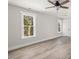 Bedroom with a ceiling fan, recessed lighting, and views of the outdoors at 624 S Eighth St, Mebane, NC 27302