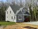Charming new construction home with board and batten siding, a welcoming porch, and modern design at 624 S Eighth St, Mebane, NC 27302
