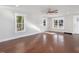 A well-lit living room with hardwood floors, offering a welcoming and open space at 624 S Eighth St, Mebane, NC 27302