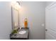 Simple bathroom with granite vanity and mirror at 63 Rice Rd # 01, Zebulon, NC 27597
