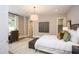 Spacious bedroom with a desk area and en-suite bathroom at 63 Rice Rd # 01, Zebulon, NC 27597