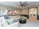 Spacious bonus room, featuring a sectional sofa and access to upper hallway at 63 Rice Rd # 01, Zebulon, NC 27597