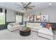Bright bonus room with sectional sofa and large windows at 63 Rice Rd # 01, Zebulon, NC 27597