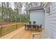 Deck with dining set and seating area, overlooking backyard at 63 Rice Rd # 01, Zebulon, NC 27597
