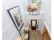 Bright two story foyer with wood floors and a chandelier at 63 Rice Rd # 01, Zebulon, NC 27597