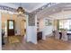 Elegant entryway with hardwood floors, butterfly wallpaper, and built-in shelving at 63 Rice Rd # 01, Zebulon, NC 27597