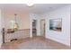 Upstairs hallway with hardwood floors and a view into a bedroom at 63 Rice Rd # 01, Zebulon, NC 27597