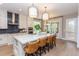 Gourmet kitchen with island, quartz countertops, and stainless steel appliances at 63 Rice Rd # 01, Zebulon, NC 27597
