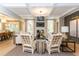 Living Room with coffered ceiling, fireplace, and large windows at 63 Rice Rd # 01, Zebulon, NC 27597