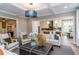 Open living room with views into kitchen and breakfast area at 63 Rice Rd # 01, Zebulon, NC 27597