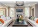 Elegant living room with fireplace and ample natural light at 63 Rice Rd # 01, Zebulon, NC 27597