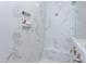 Clean shower with marble tile and built-in shelving at 63 Rice Rd # 01, Zebulon, NC 27597