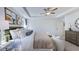 Comfortable main bedroom with a tray ceiling, neutral tones, and ample space at 664 Morning Glade St, Wake Forest, NC 27587