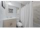 Clean bathroom with a shower/tub combo and light vanity at 7002 Longstreet Dr # C, Raleigh, NC 27615