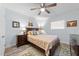 Comfortable bedroom with a full bed and unique rug at 7002 Longstreet Dr # C, Raleigh, NC 27615