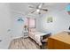 Cozy bedroom with a twin bed and light décor at 7002 Longstreet Dr # C, Raleigh, NC 27615
