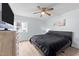 Spacious bedroom with king-size bed and large window at 7002 Longstreet Dr # C, Raleigh, NC 27615