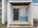 Condo entrance with dark door and light blue trim at 7002 Longstreet Dr # C, Raleigh, NC 27615